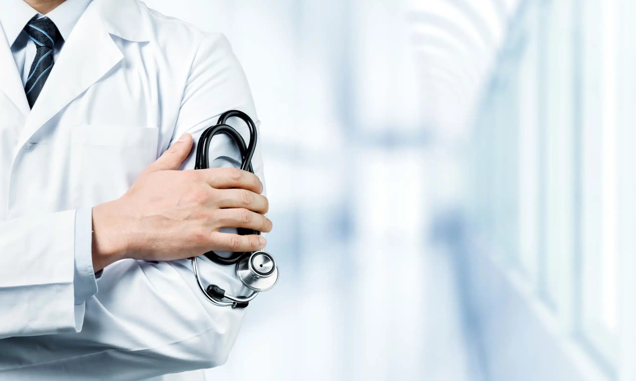 doctor holding stethoscope scaled